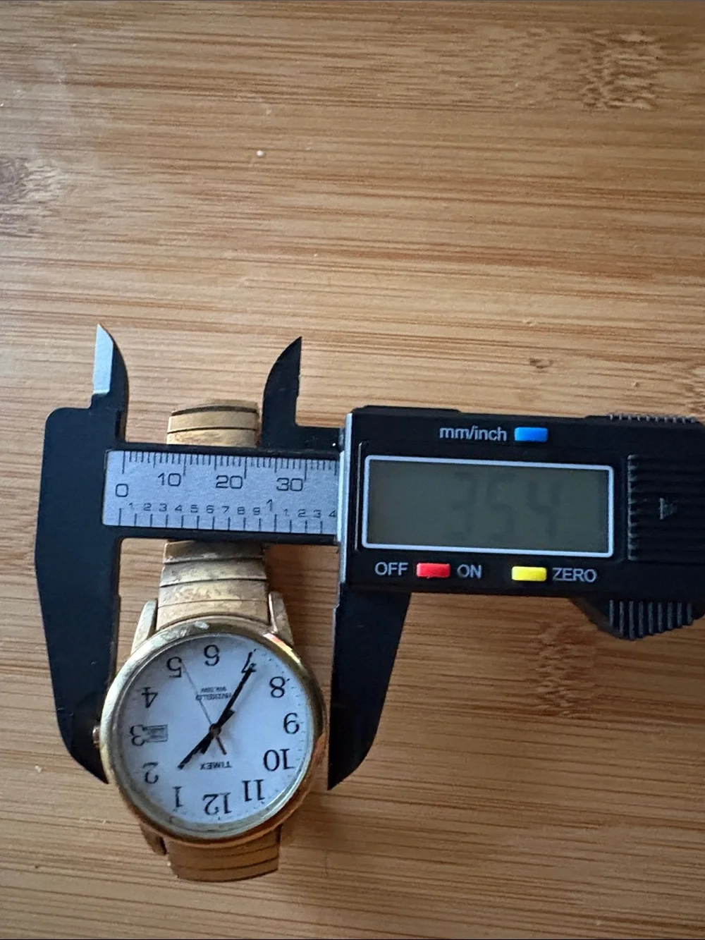 Timex Gold Tone Watch with White Dial